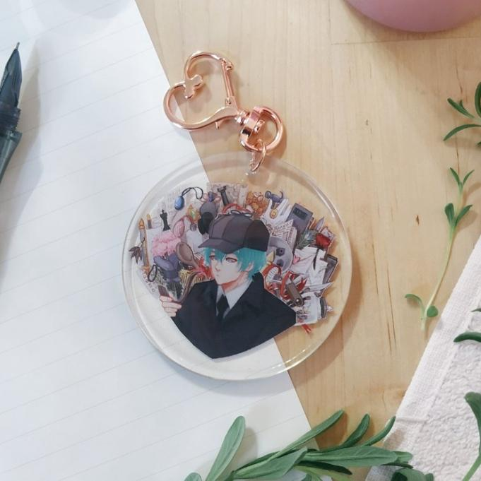 Lost &amp; Found Leftover sales close in 2 days.

Check out out Detective Byleth charms, priced at $12 USD each. They're acrylic, 2.5 inches, double-sided and glitter epoxy with a heart clasp 💖

Shop: tinyurl.com/lfcartel