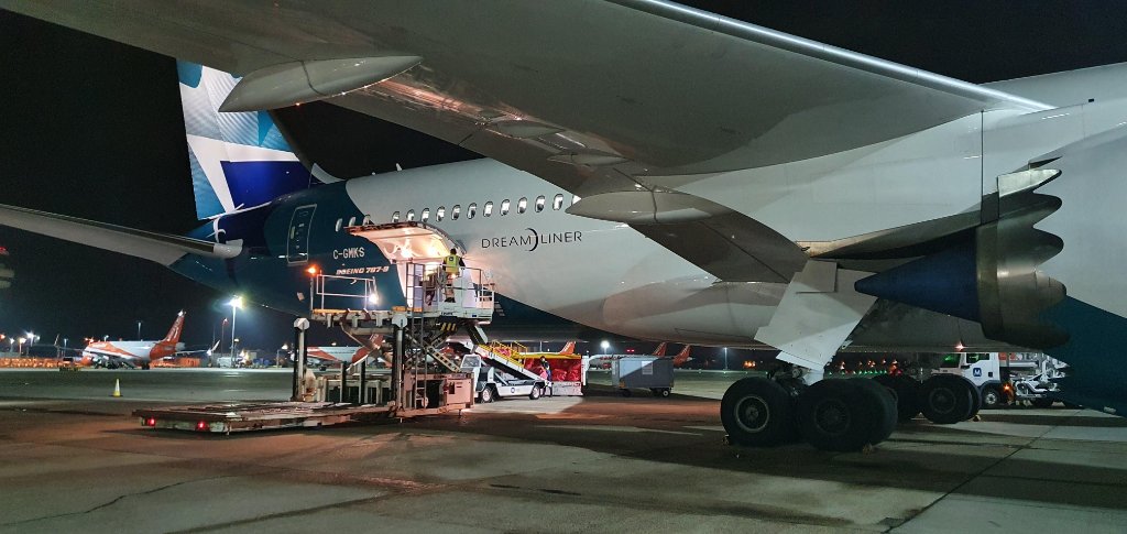 WestJet's tweet photo. We’ve begun operating our first cargo-only flights between Toronto (YYZ) and London-Gatwick (LGW) 2x weekly on our #WestJet787 Dreamliners. Our Cargo team continues to work around the clock as part of our commitment to keeping vital supply chains open. https://t.co/wq0lrjWwwd https://t.co/HeDt3txwbC