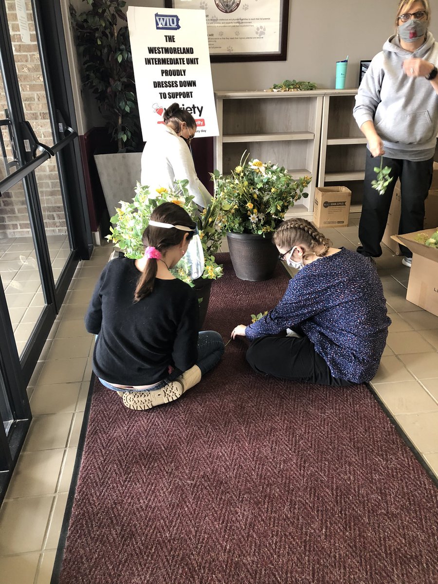 Floral arrangements made from donated silk flowers. #educationpartnership