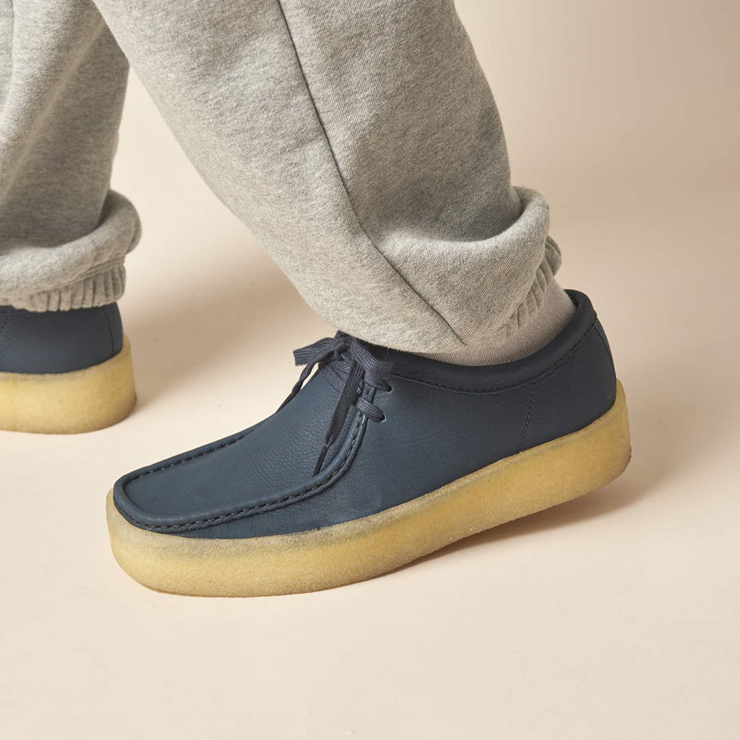 size? on Twitter: "Clarks reimagines its famed Wallabee shoe in an all-new 'Cup' style. The model boasts a raised gum rubber sole unit and sunken upper that's built a navy blue-hued