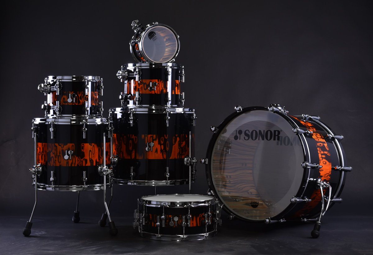 sonordrumco's tweet photo. Happy Finish Friday!! What do you think about this version of our Tribal veneer?!? Orange Tribal Stripes (high gloss) with Tiger Finish veneer inside!! Build your own dream drum today using our 3D kit configurator: https://t.co/xb9fO3DpFR #sonor #sq2 #customdrums https://t.co/DmFzgKtxgA