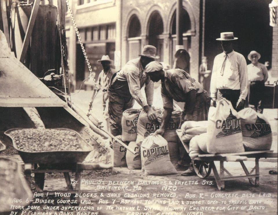 St Paul Street between Baltimore and Fayette St.  This photo was taken in August of 1920.  We removed wood blocks laid in sand and replaced it with a concrete base and asphalt surface.  The photo shows the concrete being mixed on site.