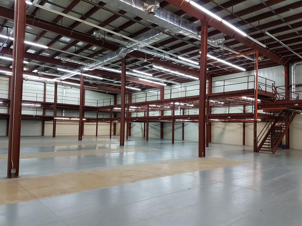 ChrisMTess's tweet photo. We said the storage facility had to be empty by the end of the month. Mission accomplished! And the floors are shining! #AwesomeTeam #IngeniumBigMove @SciTechPreserv @IngeniumCa https://t.co/A20UZymMQP