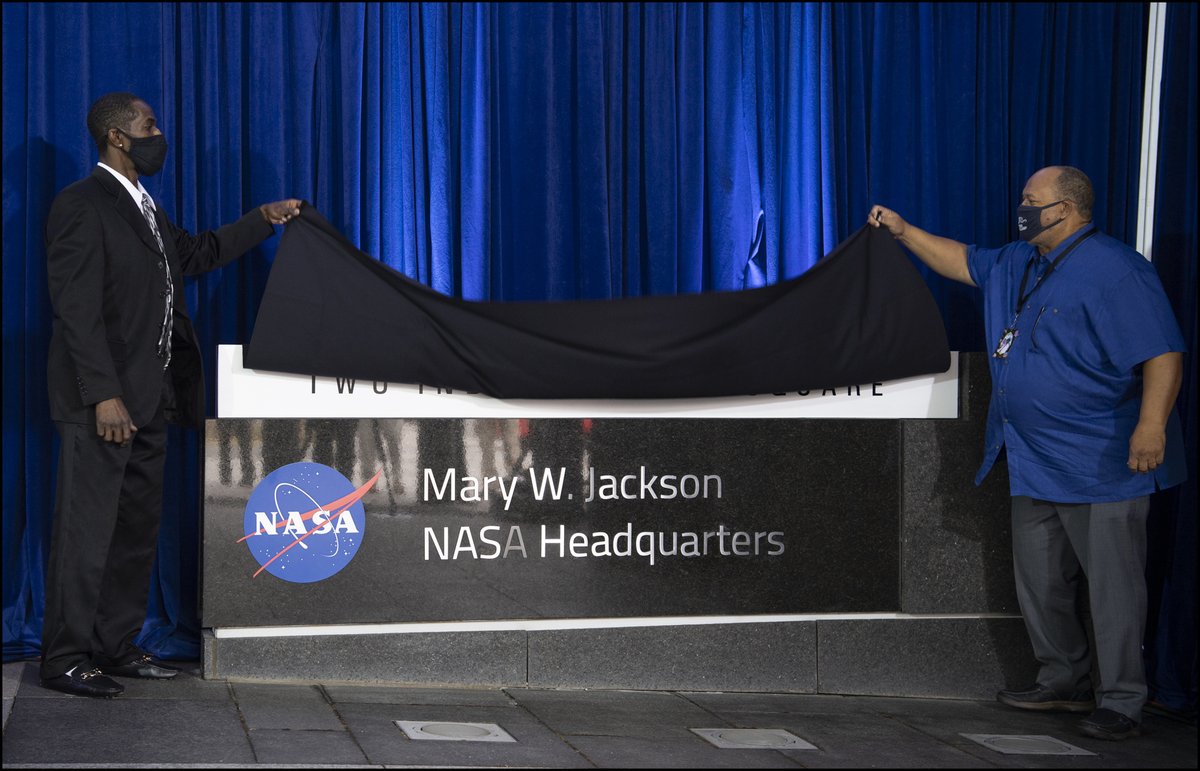 The Mary W. Jackson NASA Headquarters sign is unveiled by her grandson Bryan Jackson, left, and son-in-law Raymond Lewis, right, during the naming ceremony this afternoon. More pictures from the ceremony ➡️ https://t.co/GLb2g5iOkf https://t.co/PXgNfGFP73