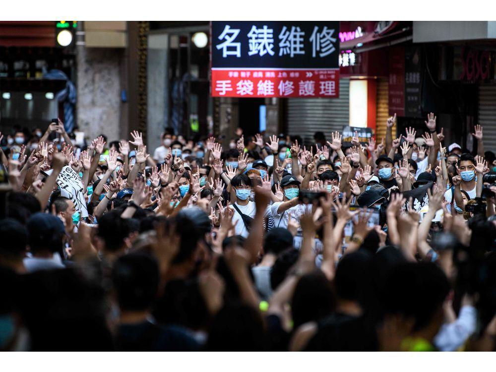 OttawaCitizen's tweet photo. Ramani: Hong Kong asylum-seekers could be China's gift to Canada https://t.co/TyFH1zFCIR https://t.co/zy5dkaAYGJ