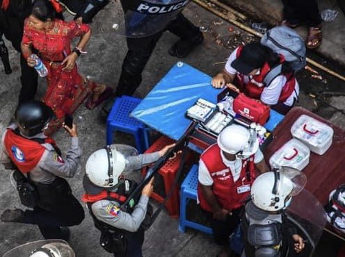 A police points to a  volunteer medical personnel in Yangon. Photo from <a href="/IrrawaddyNews/">The Irrawaddy (Eng)</a>  #WhatsHappeningInMyanmar