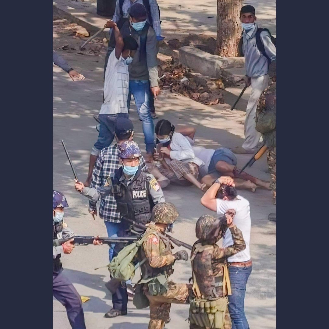 A photo says lots of words. Police (even no uniform) and soldiers violent on unarmed people. Who will protect us?  
<a href="/UNHumanRights/">UN Human Rights</a>
#WhatsHappeningInMyanmar #Feb27Coup