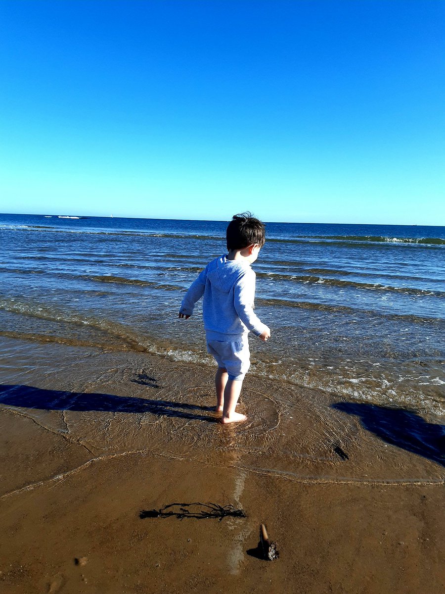 nufc4444's tweet photo. They say it's grim up North...........!? Me and my son today on the Northumberland coast😎
#febheatwave #Goodtimes https://t.co/w3DBu15hQH