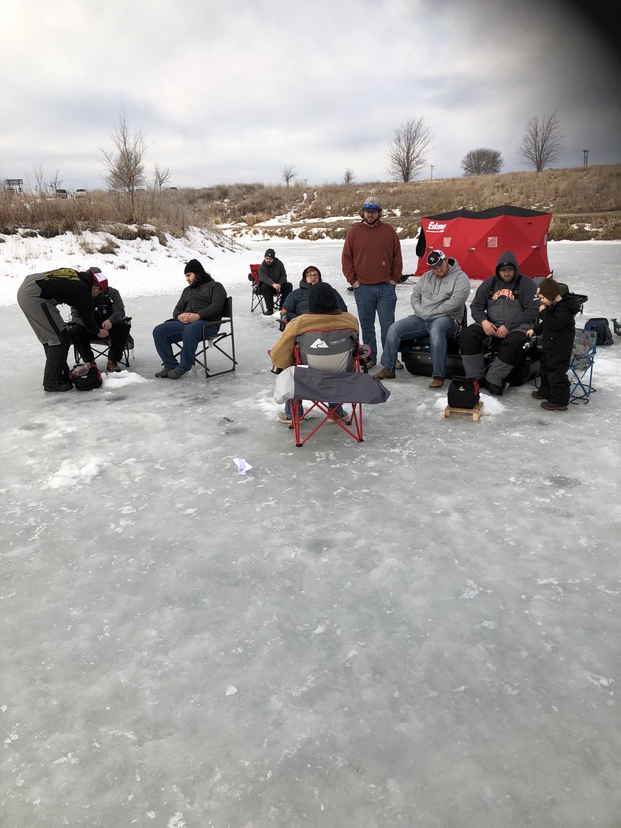 Coach_Mingo's tweet photo. Beautiful morning for ice fishing with the ⁦@DordtFB⁩ Offensive Line.  After 1 qtr of play the score is Breakfast Pizzas consumed 6, Fish caught 0. https://t.co/Xd0iKbVp38
