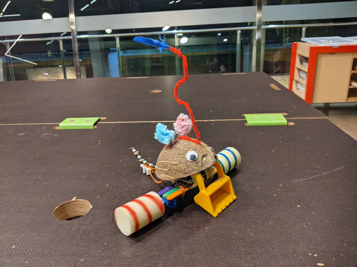 smartinseb's tweet image. It&apos;s a cocoroomba! We set out to make a carnival float for #MicrobitVirtualParade, but then the materials in the Tinkering space at @CosmoCaixa_CAT inspired to build this cheery creature that &quot;helps&quot; cleaning the table. We did add carnival music🎉👇!!#ComputationalTinkering (1/2)