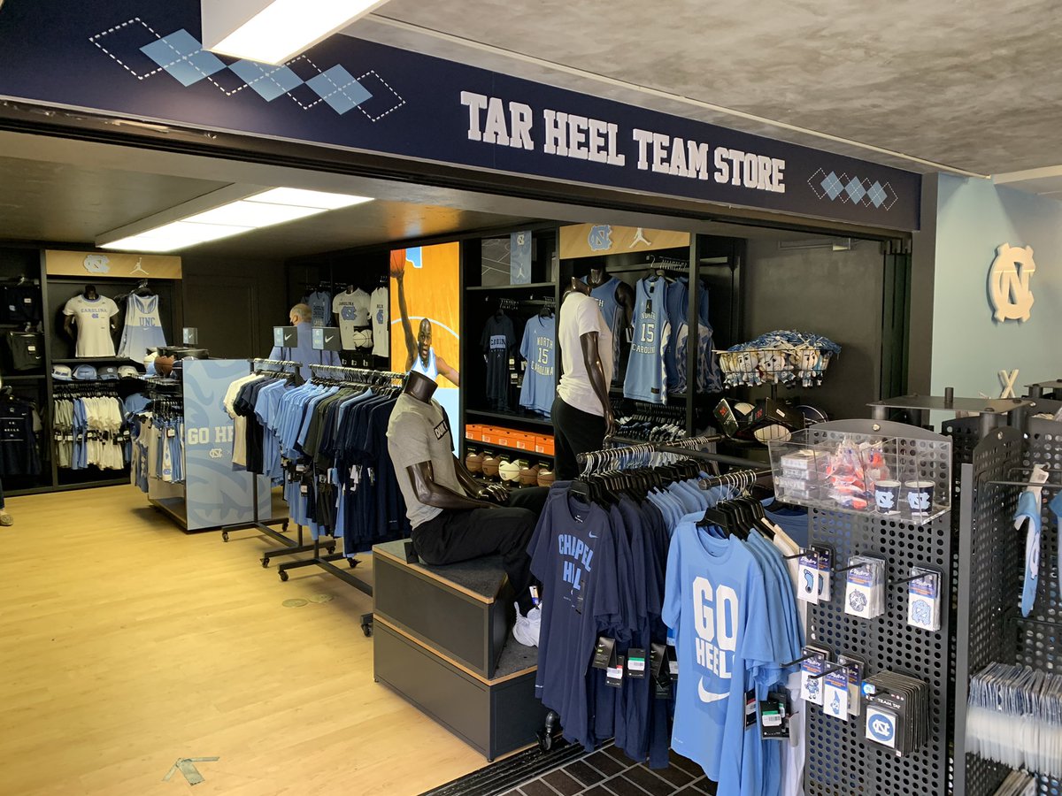 GoHeelsGameDay's tweet photo. Mandatory 😷 wearing for everyone inside the Dean E. Smith Center. Bring yours and you can buy #Carolina themed 😷 & some great new items from our merchandise partner @dyehard_fans at the Store across from section 125:
🔈
🎧
👕
🧢
🕶
#GoHeels | #TogetherWin https://t.co/beZgS2oYmT