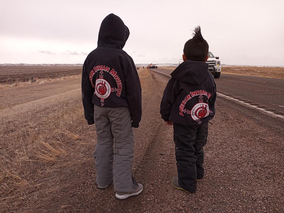 thedrsec's tweet image. Walkers coming in from the south during the four-directions walk leading to Wounded Knee. Liberation Day 2021 commemorates the 48th anniversary of Wounded Knee '73. via President @kevinck04