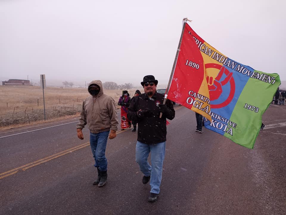 thedrsec's tweet image. Walkers coming in from the south during the four-directions walk leading to Wounded Knee. Liberation Day 2021 commemorates the 48th anniversary of Wounded Knee '73. via President @kevinck04