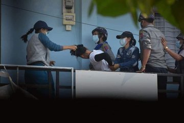 zai_tss's tweet photo. This is how Armed Junta Police is treating the unarmed citizens! @YourAnonCentral @UN @POTUS 
SPRING REVOLUTION
#WhatsHappeningInMyanmar 
#Feb28Coup https://t.co/G942UjkS9W