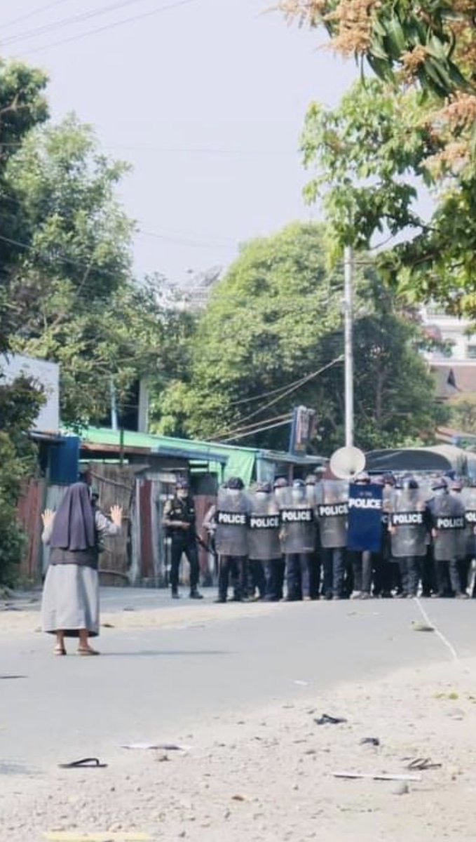 FreeKachin's tweet photo. #myitkyina #CatholicChurch nun pleading police not to shoot at peaceful protestors. #Myanmarcoup #BurmaCoup https://t.co/yc1r6T1HkP