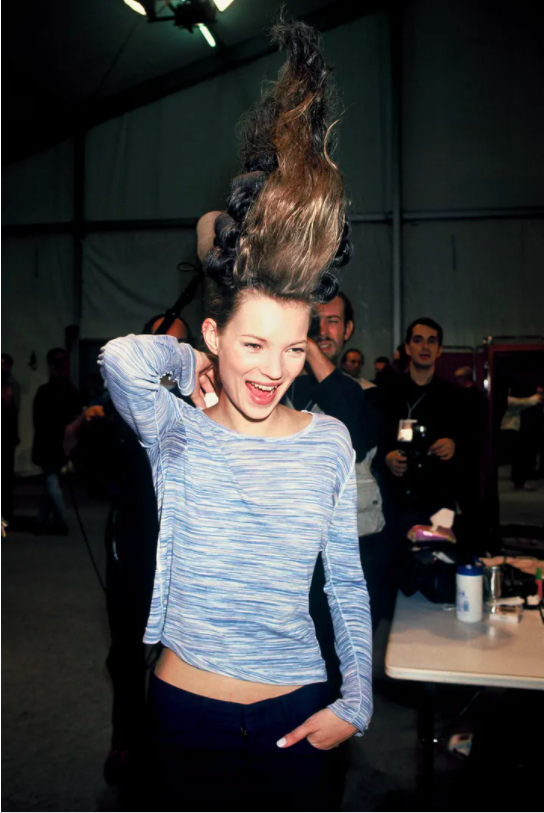 Behind the scenes photos of the iconic micro mini skirt look worn by Kate  Moss at Vivienne Westwood's Spring/ Summer 1994 'Café Society'…