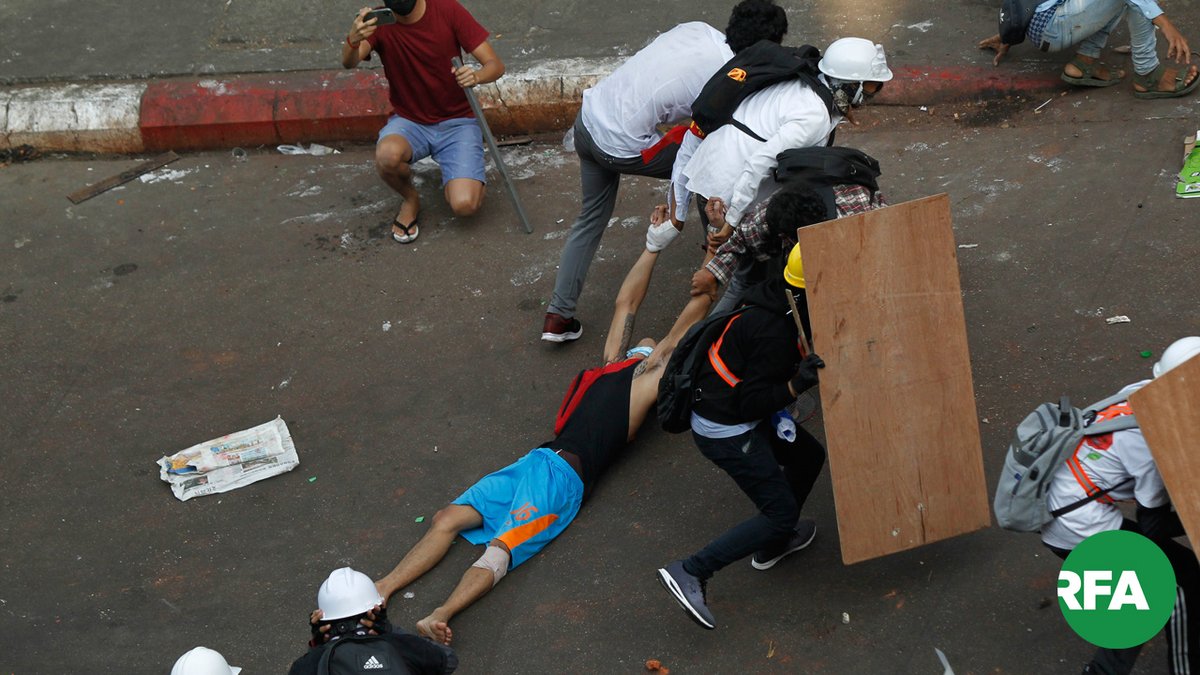 PVamplify's tweet photo. Photos of 2 protesters gunned down by the brutal police today #Feb28Coup in Hledan Yangon with serious injuries as they were carried to safety by fellow protesters. Total 5 injured from shooting in Hledan this morn'. #MilkTeaAlliance #WhatsHappeningInMyanmar https://t.co/akzUOt40qE