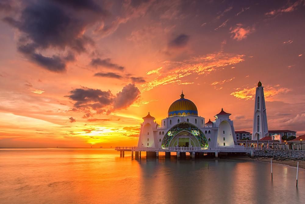 We're visiting another mosque this evening, the Melaka Straits Mosque (in Malay, Masjid Selat Melaka) in Malaka City, Malaysia. It's built on the man-made island of Malaka Island. The mosque actually appears to be floating on the water when the water level is high. The.....