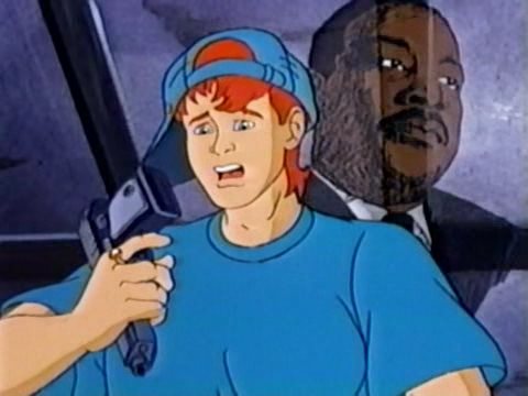 Clayton tosses Wheeler a gun. MLK Jr disapproves. Clayton asks, "How you like your new piece, man?" Then he lets out a cartoon villain guffaw.