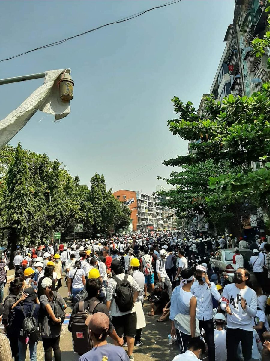 Yangon: After so many bloody crackdown this morning in Yangon, different protest groups started to gather at Hledan Road and forming the big crowd. We will never be defeated and we will never give up.

#WhatsHappeningInMyanmar 
#MilkTeaAlliance
#Feb28Coup