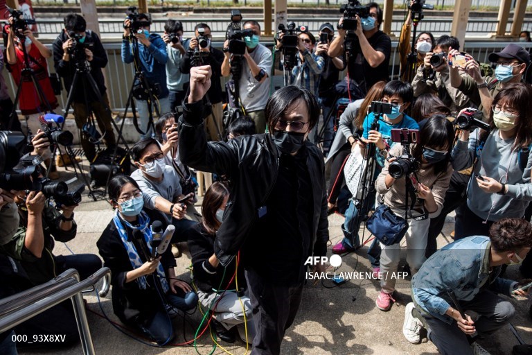 AFPphoto's tweet photo. Dozens of Hong Kong dissidents charged with security crime #AFP 
https://t.co/SiwwnUWj1J
 📷 Isaac Lawrence https://t.co/KrW6odKpoO