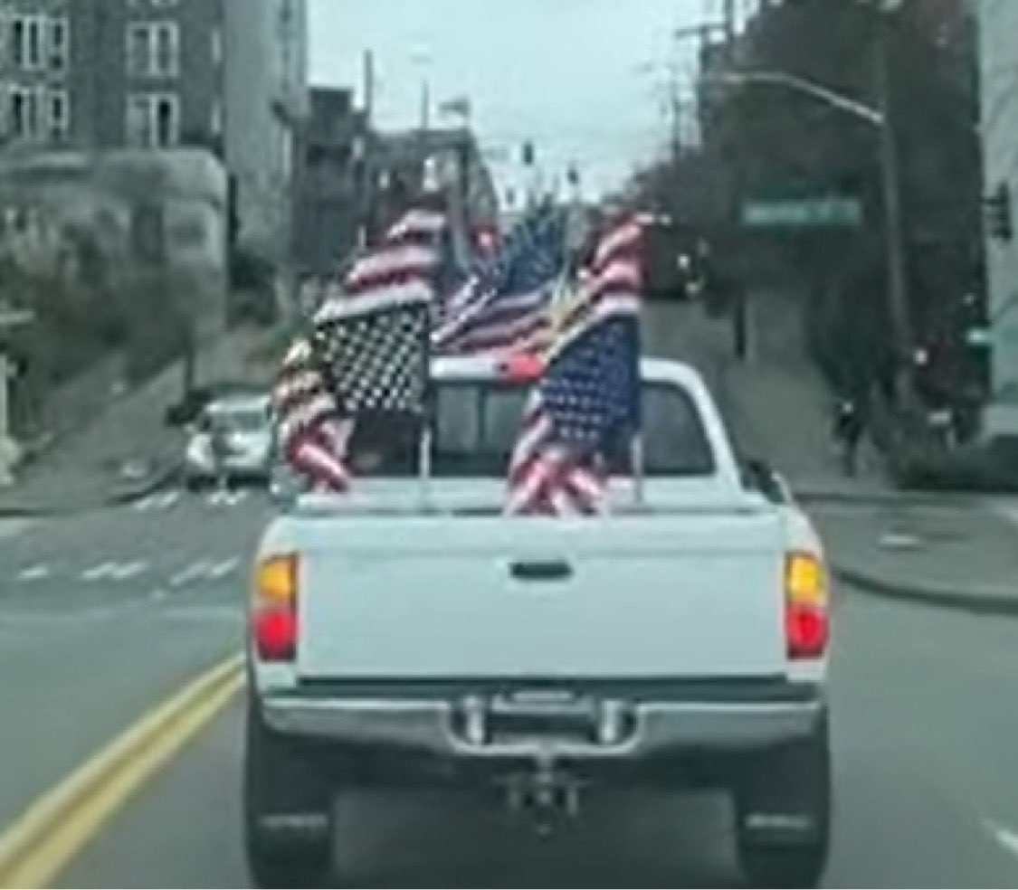 spekulation's tweet photo. Oh look, several MAGA losers are cruising around Capitol Hill at this very moment, with their license plates covered, and the Seattle Police Department does not appear to be doing a damn thing about it. Fascinating. https://t.co/tSrZ12atVr