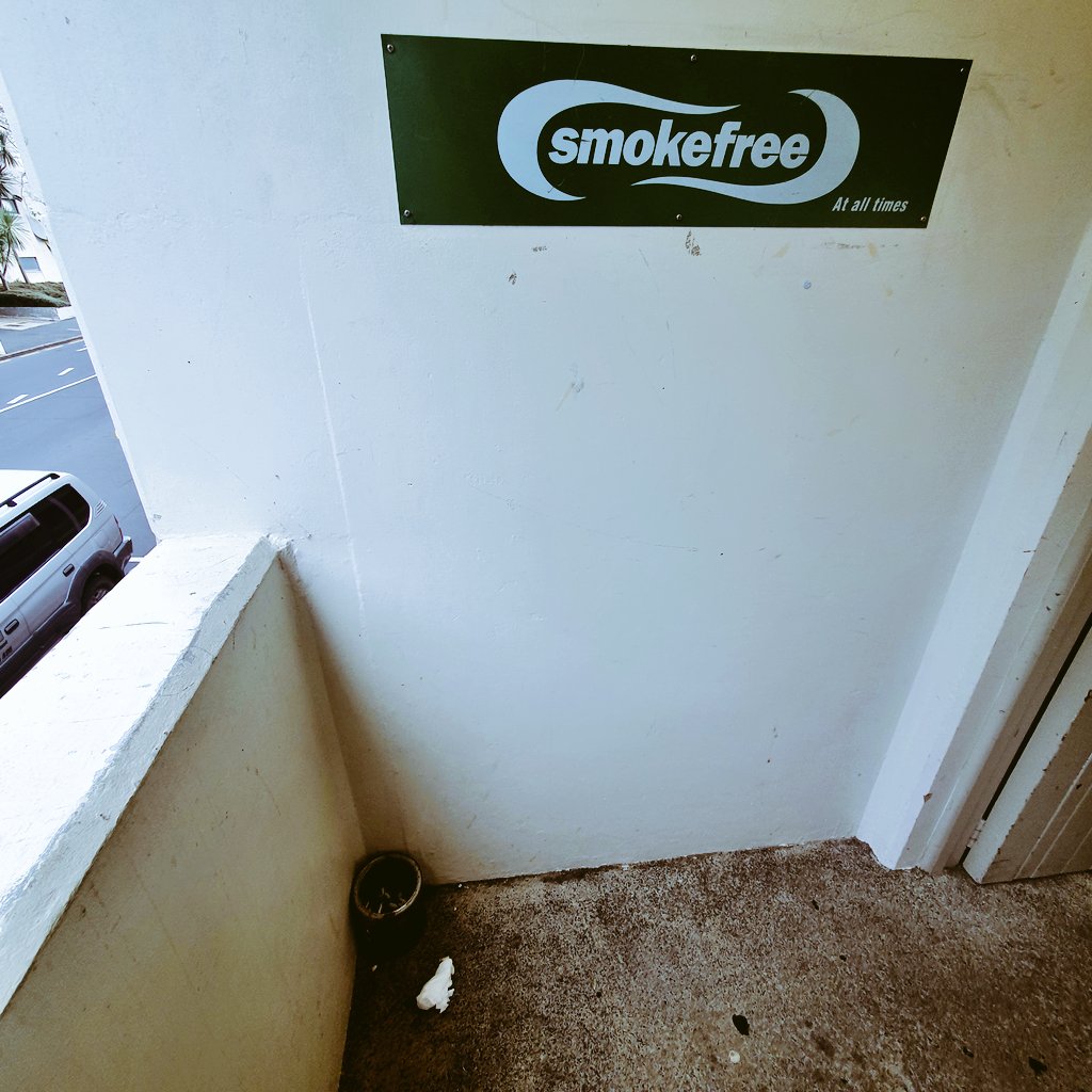 slobberchop's tweet photo. I never understand the lack of interest from people. Sign clearly says smokefree, but below is i 'butts' tin.. which interestingly has butts chucked all around it!
#shitrules #smokefree #cleanup #justgross https://t.co/8gv4Jmoyca