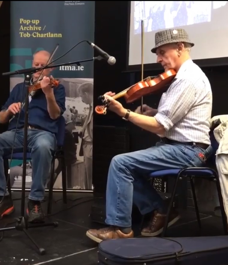 ITMADublin's tweet photo. ITMA is saddened to hear of the death of Down fiddle player & maker Geordie McAdam. Privileged to have organised talk/presentation featuring him with Nigel Boullier in February 2020 @GradamCeoilTG4 #handeddown @TheRollingWave https://t.co/0uLQfyrQKl