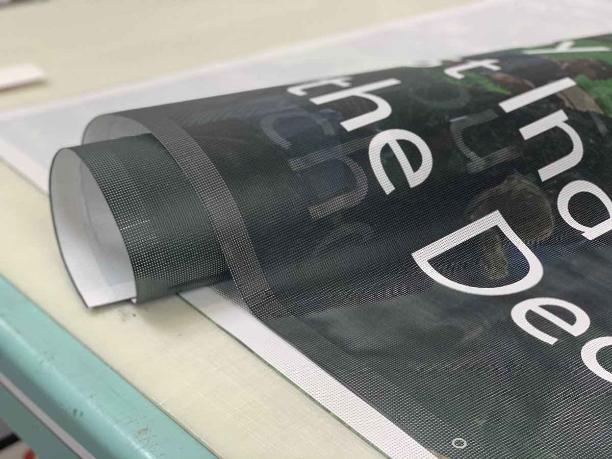 Here is an external 2+ metre wide banner in the process of being hemmed for extra strength before the application of metal eyelets ready for hanging. These are being printed onto a PVC mesh material which is a perfect choice for more exposed placement or windier conditions.