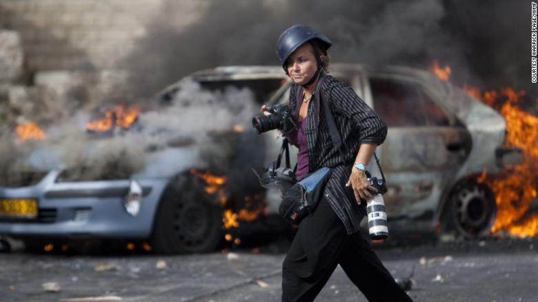CNNPhotos's tweet photo. In honor of #InternationalWomensDay, look back at the pioneering women of photojournalism: https://t.co/lGe3cbQOdJ https://t.co/WdI1HdzCFM