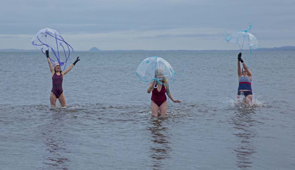 I’ve had the best  #IWD
Swimming in the North Sea with 2 lovely colleagues + social workers at <a href="/MCFB1/">MCFB</a> dressed as jellyfish to raise money to support minority ethnic women affected by #GBV. We’ve reached over £600! So thankful to our wonderful supporters 💜💜💜 📸 <a href="/ArchWhite2/">Arch White</a>