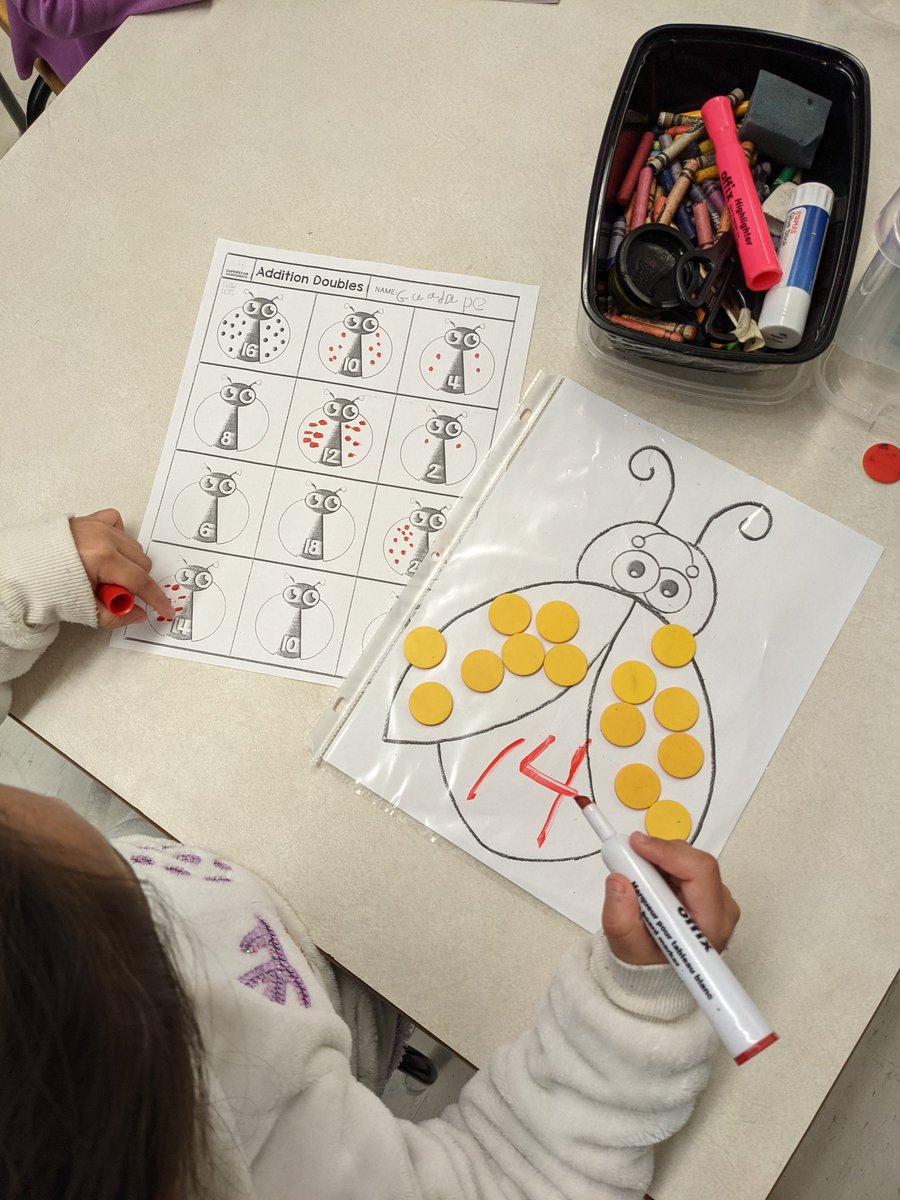 HrceJennifer's tweet photo. Partitioning numbers to 20 into two equal parts with our ladybug friends in grade 1 Dalloul. Using counters and our doubles facts anchor chart to help! @HadeelDalloul  @JoeHoweSchool #HRCEmath https://t.co/AnZQASi8Hk