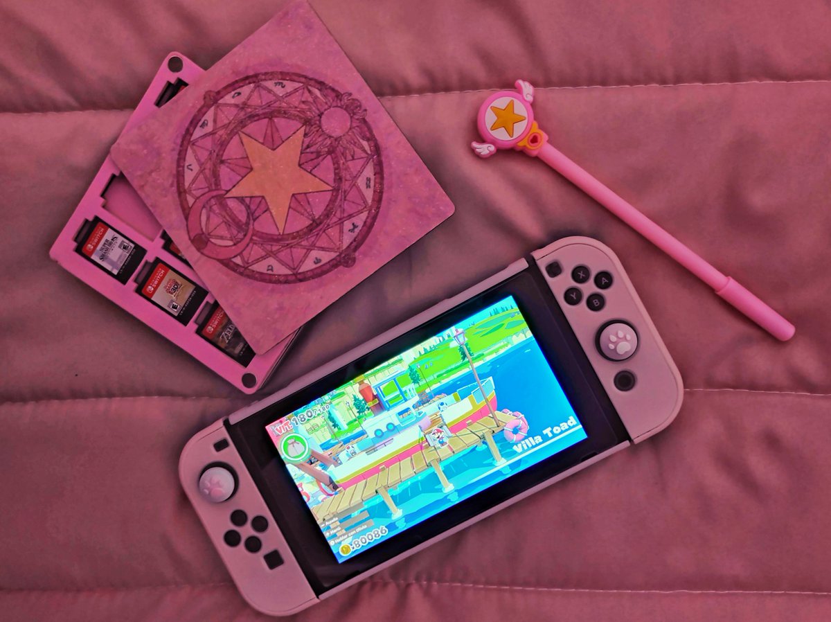 isaruval's tweet photo. My Nintendo Switch with my handmade Cardcaptor Sakura cartridge holder! ๐ธ
#PinkSwitch https://t.co/m0mKHQAeHv
