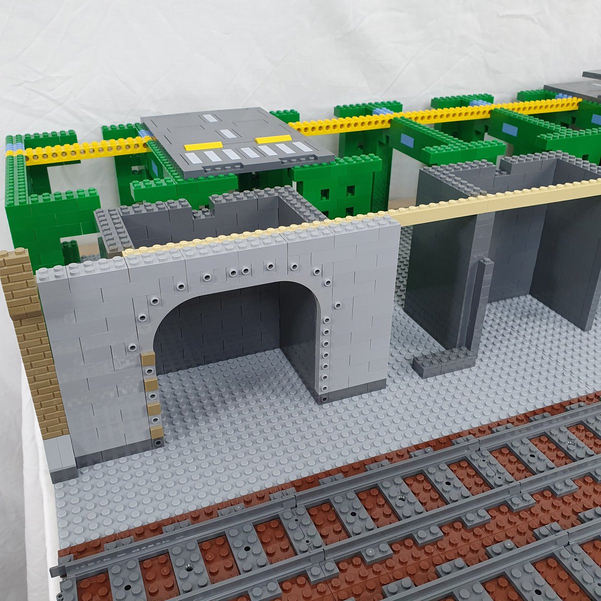 CreativeBrickB's tweet photo. YouTube video comes up tomorrow - link in bio. Building more of the raised section for my #LEGO City.
#legocity #legostructure #legobricks #legoset #legotrain #legodesign https://t.co/rkGZOEmujl