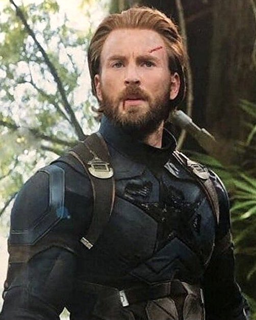 Bearded Captain America in Infinity War with dirt and blood on his face