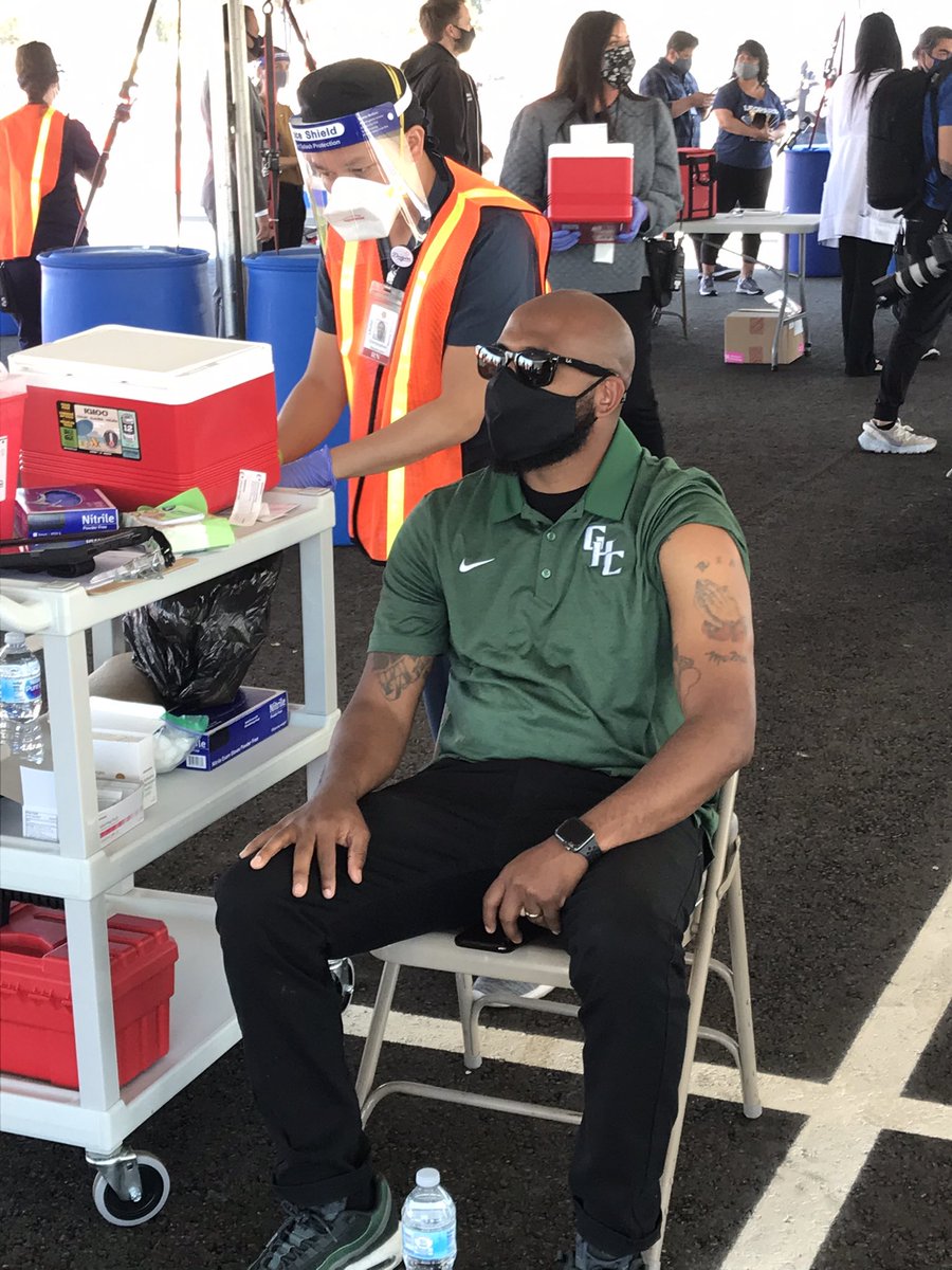 Cassy_Horton's tweet photo. Heroes among us! Charter staff who’ve been in the field and are leading the path back to campus in LA getting vaccinated at @SoFiStadium thanks to @LASchools @lapublichealth! Just thrilled to see our educators get this protection. #VaccinatedSafeReadytoGo https://t.co/mAE2wEY79G
