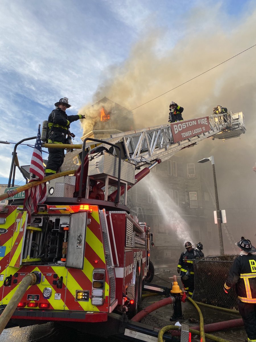 BostonFire's tweet photo. Heavy  fire from a 6 family occupied building . Heavy wind fueling the fire. https://t.co/WScVZB4Exs