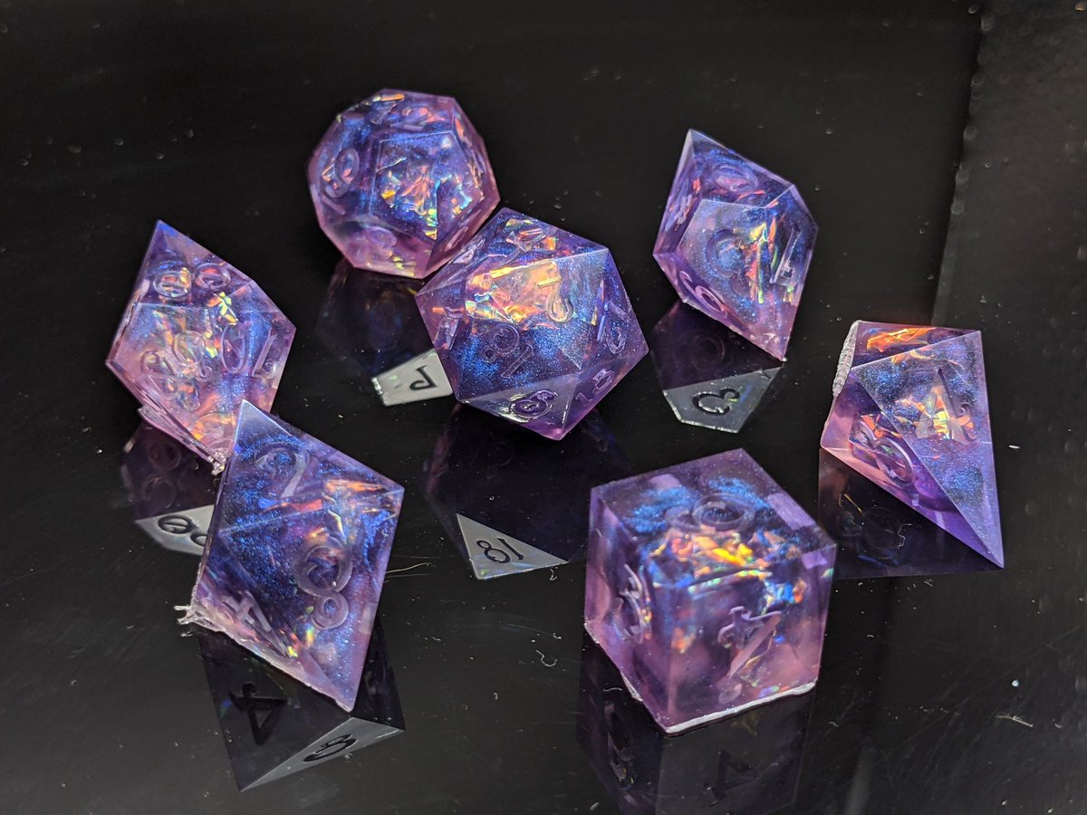 sharpstef's tweet photo. An old style: Her Empress of the Stars

Purple and pink sparkly opal dice. https://t.co/CTO3NmxfUA