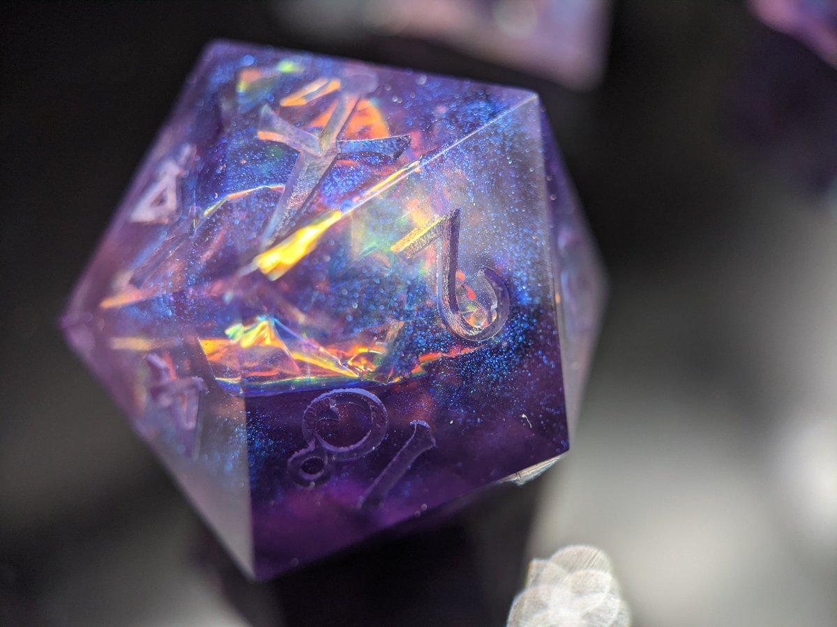 sharpstef's tweet photo. An old style: Her Empress of the Stars

Purple and pink sparkly opal dice. https://t.co/CTO3NmxfUA