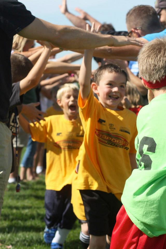 kmatthews's tweet image. Listening to my 9th grade JV footballer 🏈 watch film with his team (via a pre-practice Zoom). So weird. Life is weird. Just yesterday, he was playing tot soccer.