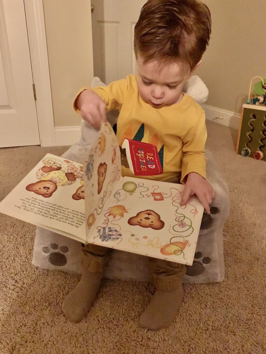 AshleyDeMauro's tweet image. My little bookworm this morning on #ReadAcrossAmericaDay. We start and end every day with a book! #earlyliteracy #readingtolearn