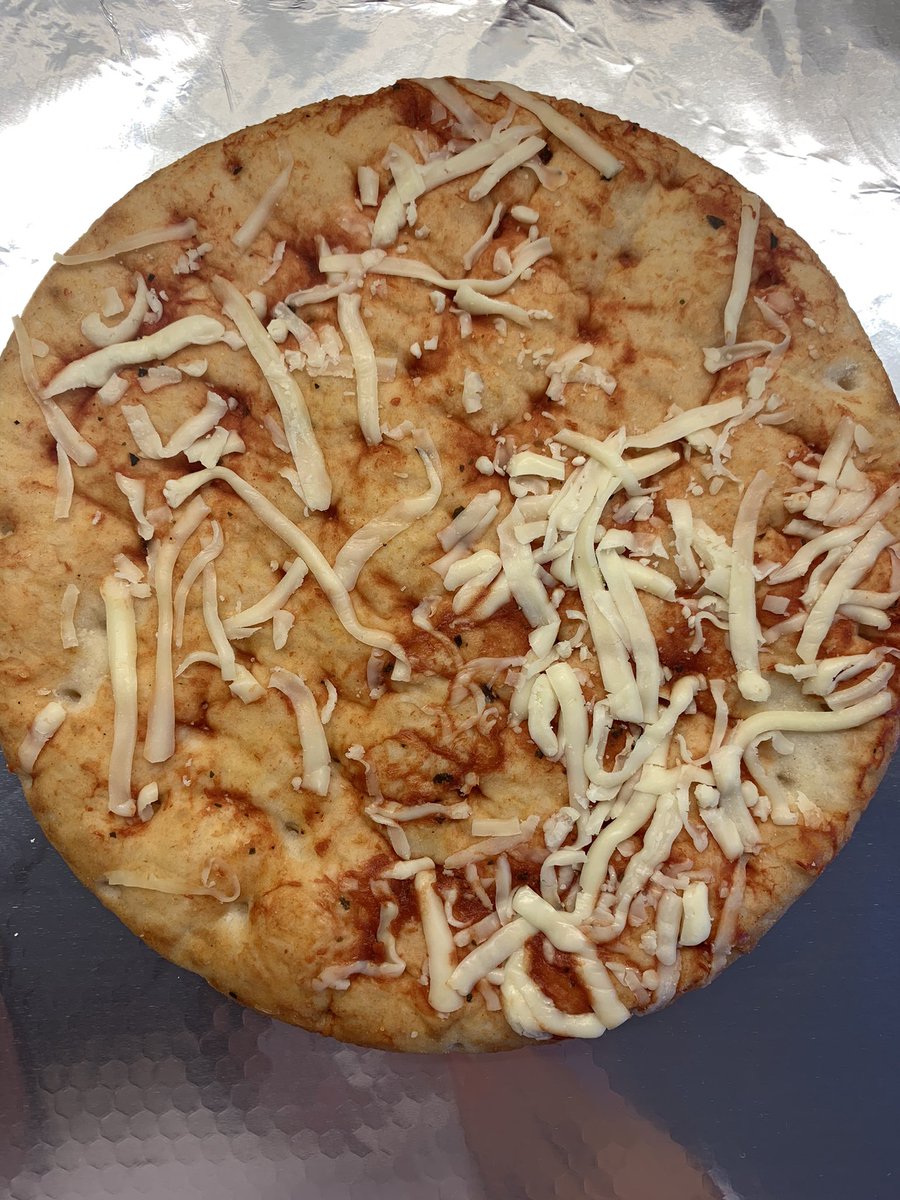 lucykwilson's tweet photo. @sainsburys Apparently this is a cheese and tomato pizza? 😂 I know times are hard at the moment but whoever made this must have a strong dislike to cheese... and tomato! https://t.co/jxU98Hmh4a