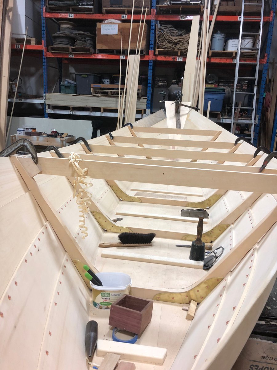 The new dory is coming along nicely! Recently, Chris and Patrick have been adding on the sheer strakes (uppermost planks). They use steam to transfer heat and moisture to them, which helps make the planks more supple as they bend them to the shape of the boat. Check it out!