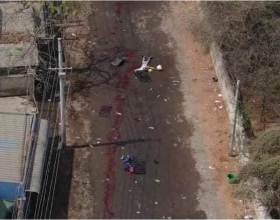 hannayuri_twt's tweet photo. TW//Bloods,Gunshots 
In Monywa,Military Terrorists killed the two protesters brutally today.They dragged by two legs,took the bodies.Victims are still unidentified because juntas still haven’t returned the bodies yet!Please help 😭
 #WhatsHappeningInMyanmar #Mar3Coup https://t.co/zpmFj71xK4