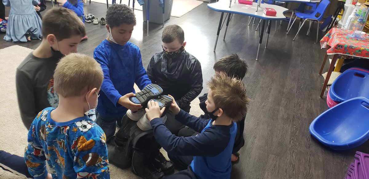 #gcbgreatstart- Synergizing activity:  Which group can build the tallest freestanding structure using shoes!