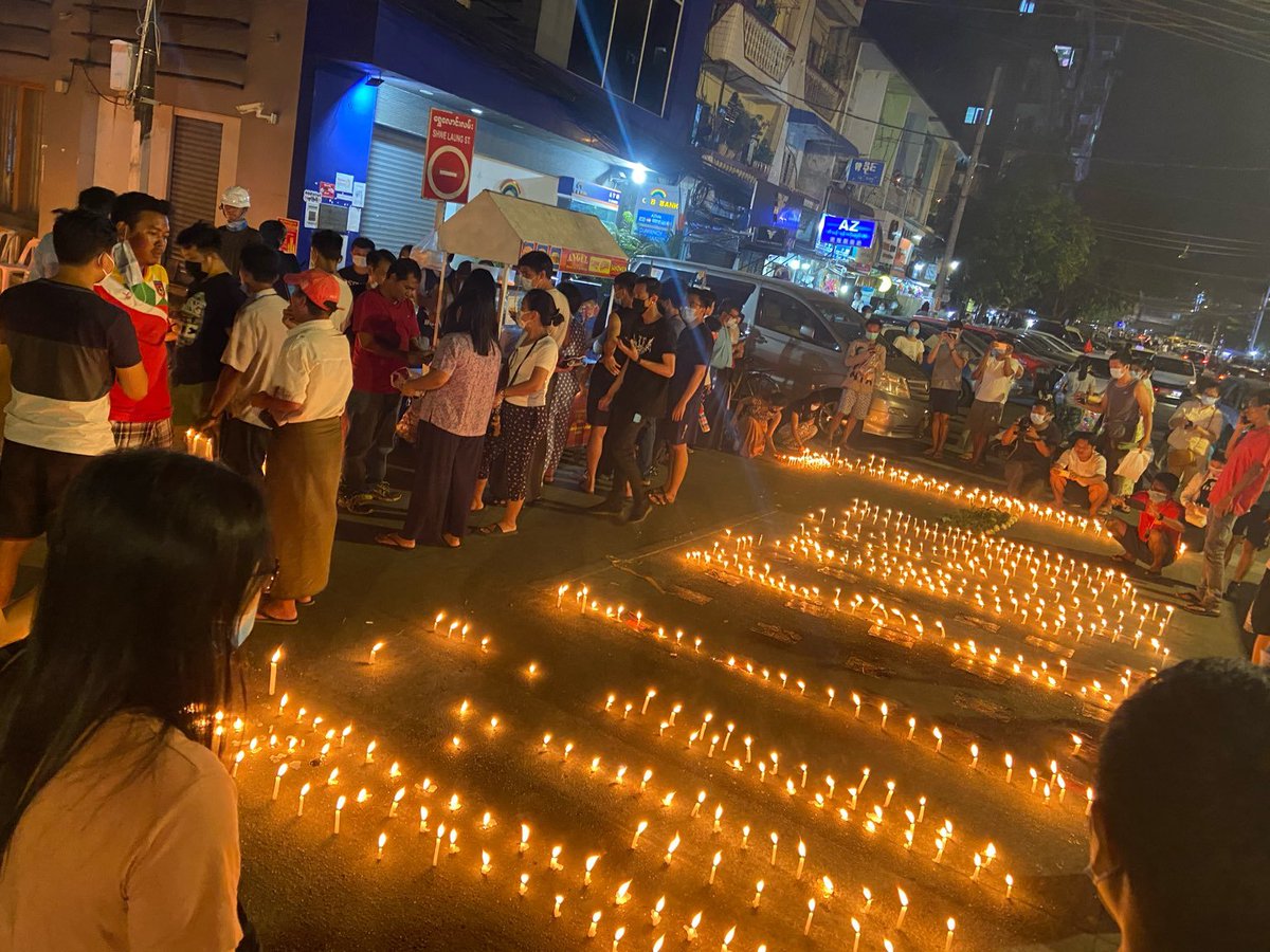 FrontierMM's tweet photo. Residents in some Yangon neighbourhoods tonight held candlelight memorials for those killed by security forces today. At least 16 people died across Myanmar, including six people in Yangon. #WhatsHappeningInMyanmar https://t.co/5hZLpbn34z
