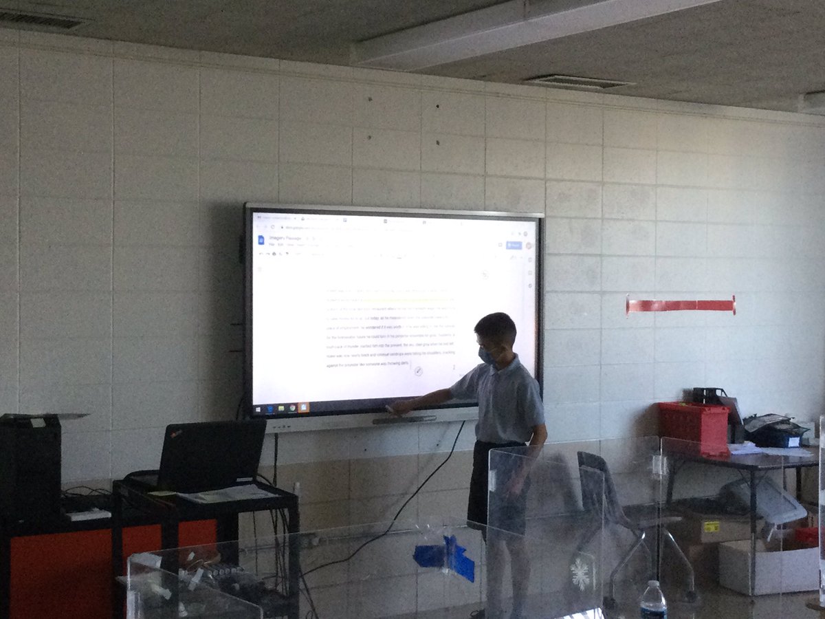 Today 7th graders used our awesome new SmartBoards to highlight examples of sensory imagery