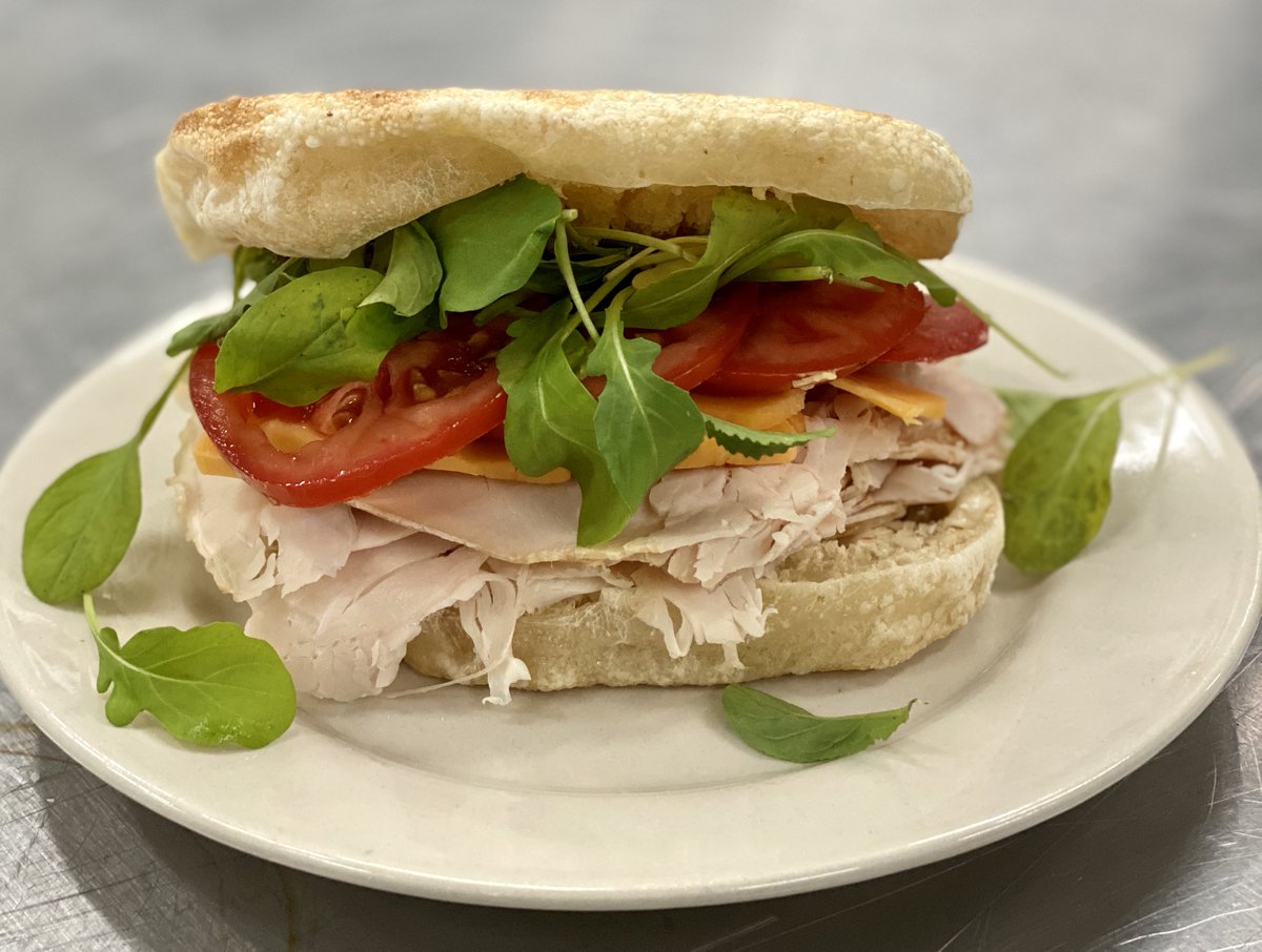 For #NationalColdCutsDay, we’re throwing it back to this timeless turkey classic 🥪: Deli-style roasted turkey breast from @marbledmeatshop, sharp cheddar @cabotcheese 🧀, @Hellmanns, sliced tomato 🍅, and fresh arugula on our #vegan sourdough ‘Original White’ variety!!!