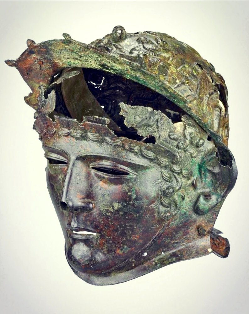 A fantastic Roman cavalry helmet discovered in 1796 by a child playing on wasteland in the village of Ribchester, England. The 1/2ndCAD helmet was found buried as part of a hoard in a deep hollow and originally had a crest and pair of trailing streamers attached to the headpiece.
