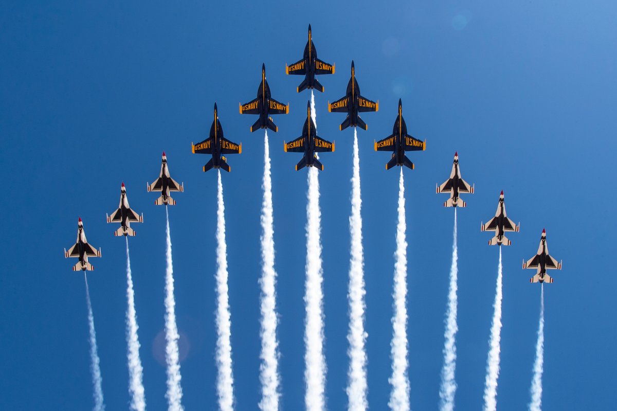 FOX13News's tweet photo. WOW! 🇺🇸 The U.S. Navy Blue Angels and the Air Force Thunderbirds just debuted this dramatic joint aerial display to honor America. MORE: https://t.co/nbMc75ViYs https://t.co/kOIHOlfvDO